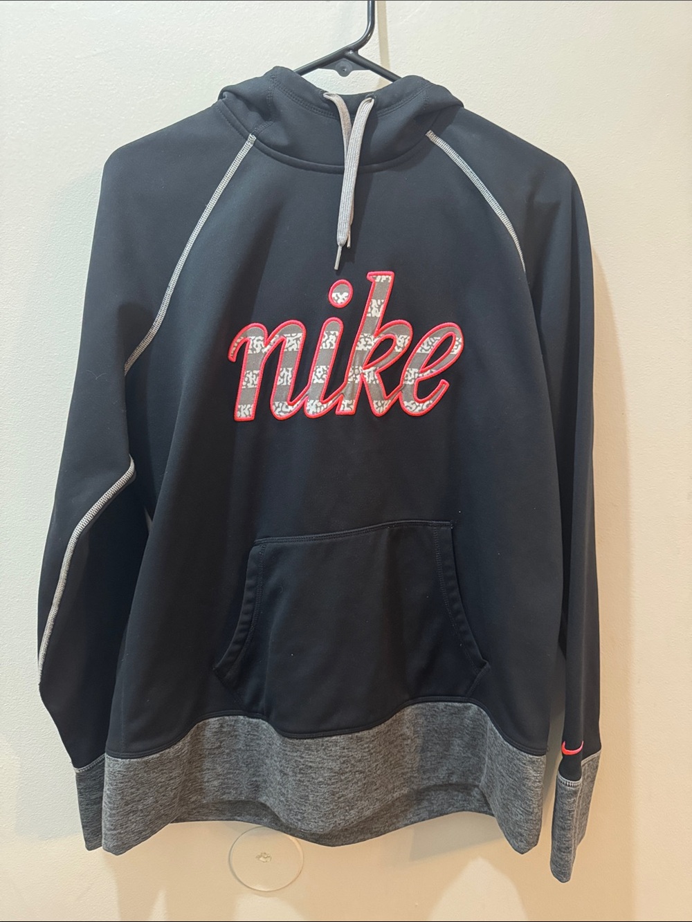 Nike Black Hoodie with Grey Accents and Red Script Logo